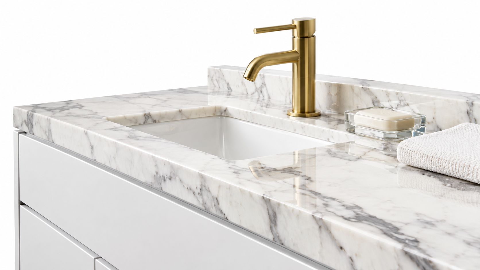 A modern marble bathroom vanity countertop with a brushed gold faucet and a white hand towel.